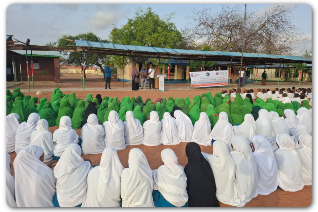 Grassroots organsation Women Organising Women, led by Katra Haji, at Wajir Town Primary School empowering girls to say no to FGM, with Head Teacher Mr Ibrahim Ali, July 2025.